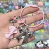 آویز جاکلیدی فلامینگو و پاپیون استیل کد 3579